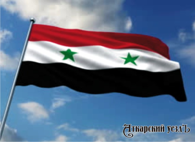 Развевающийся по ветру флаг Сирии