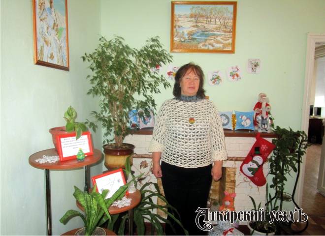 В библиотеке Аткарска появилась фотозона «У новогоднего камина»