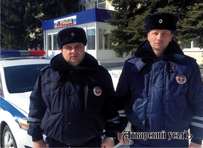 Сотрудники полиции Александр Шустов и Алексей Хаюстов