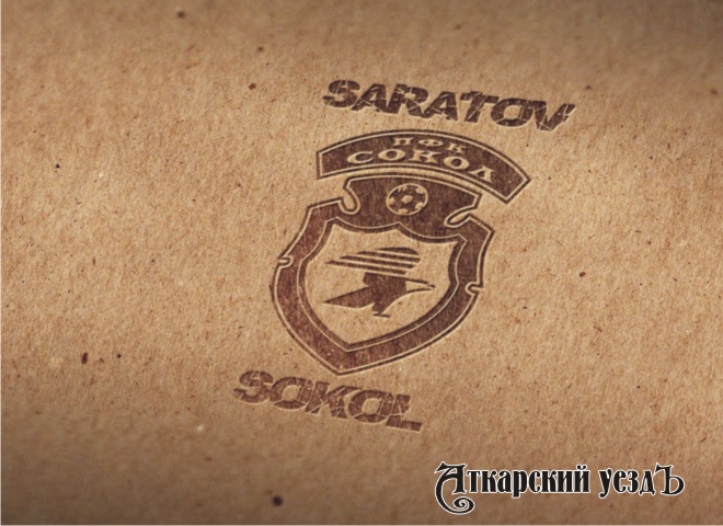 Логотип саратовского «Сокола» на бежевом фоне