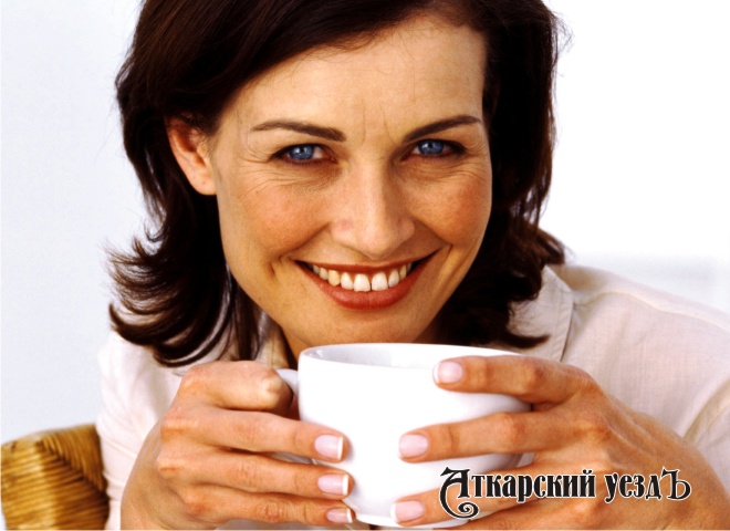 Женщина с чашечкой кофе